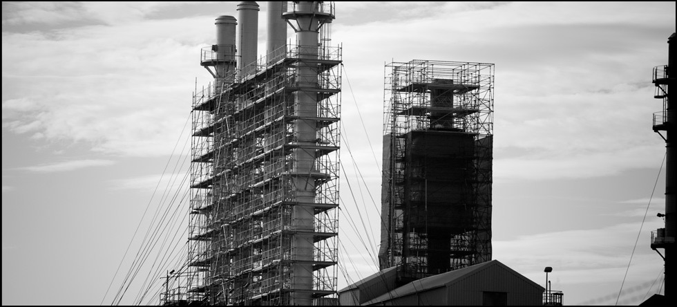 Department of the Navy: Structural and electrical repairs and surface preparation/repainting of eight smoke stacks at Building P-1.