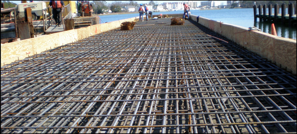 Department of the Navy: Demolition of two existing timber piers by extraction (vibration) and construction of a new concrete pier